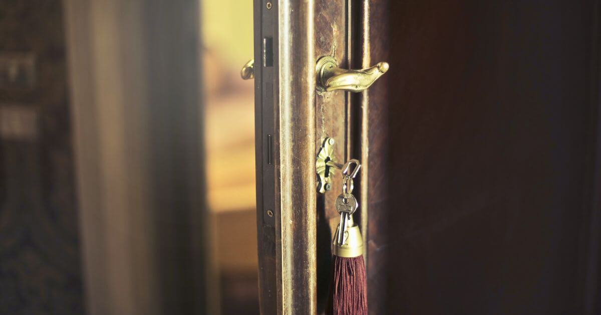 old door with key in lock